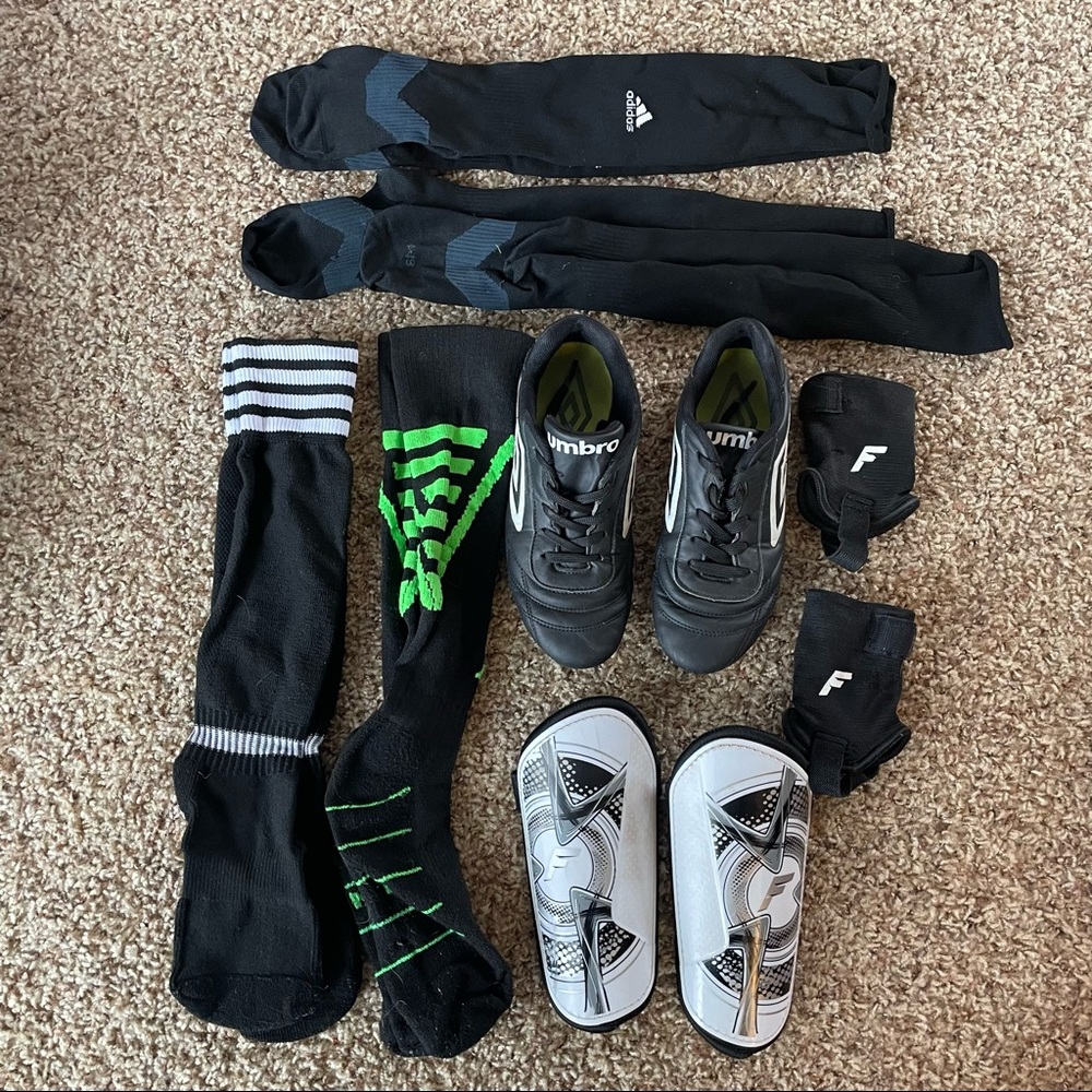 Umbro size 2 soccer cleats Franklin shin guards and socks